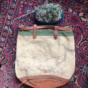 Lucky Brand leather and canvas drawstring backpack